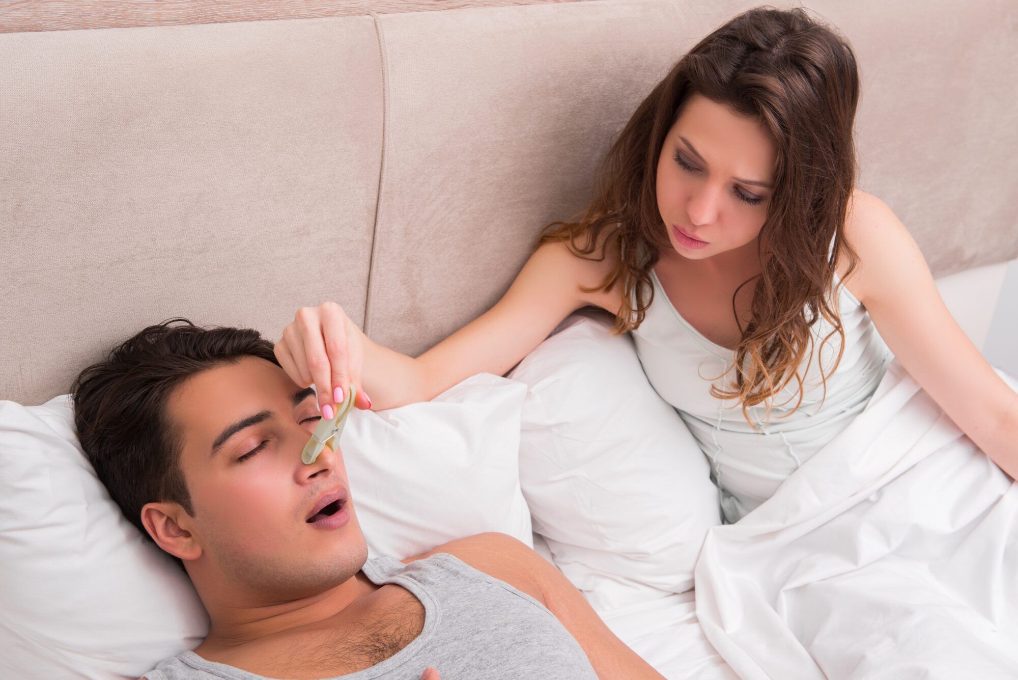 Woman having trouble with husband snoring Woman having trouble with husband snoring
